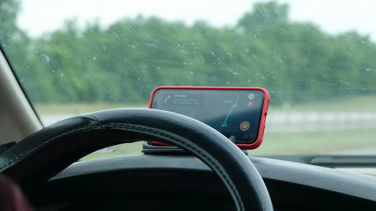 A car dashboard with a phone showing a map