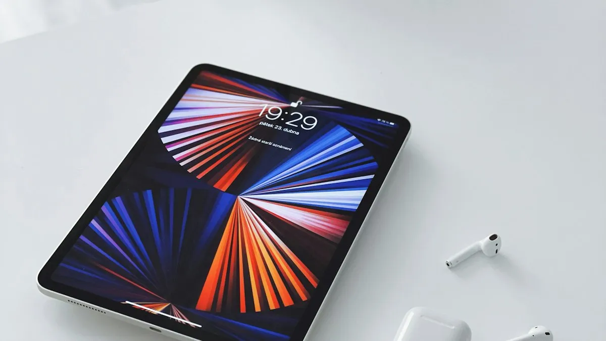 A black iPad on a white table