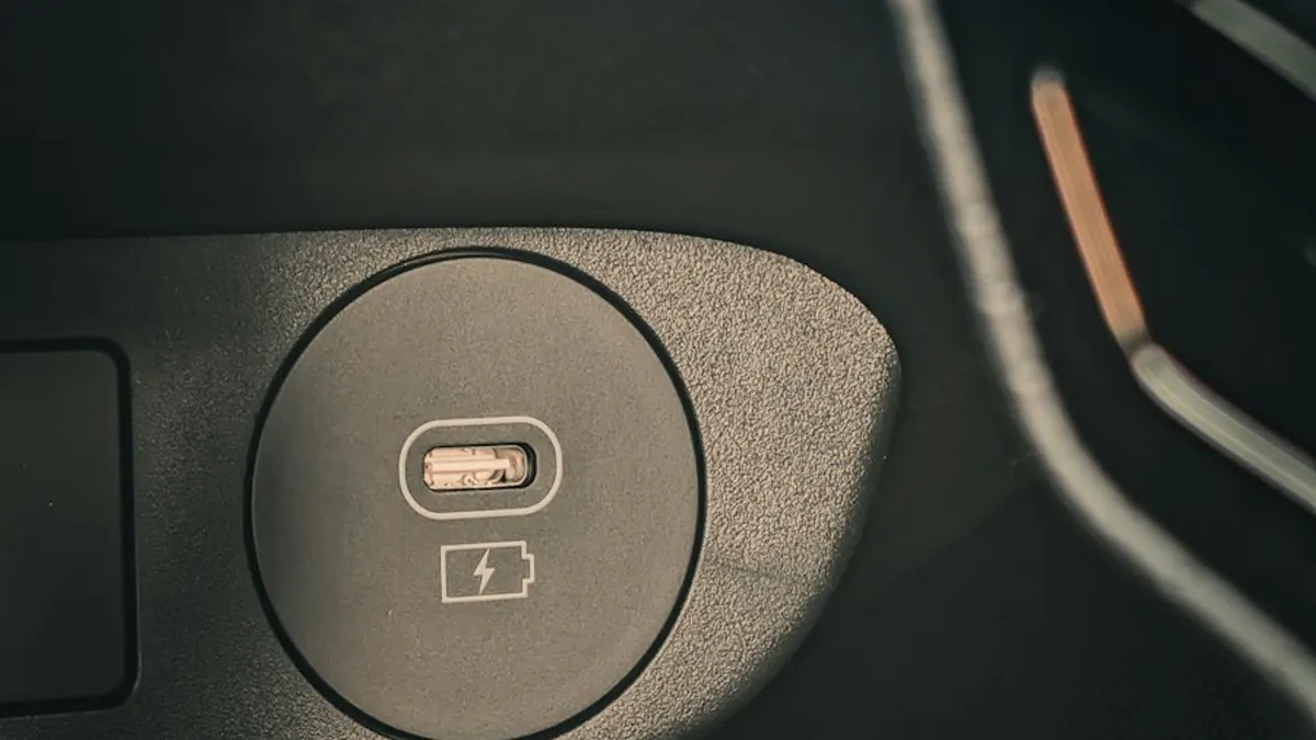 A USB-C charging port with a battery charging icon