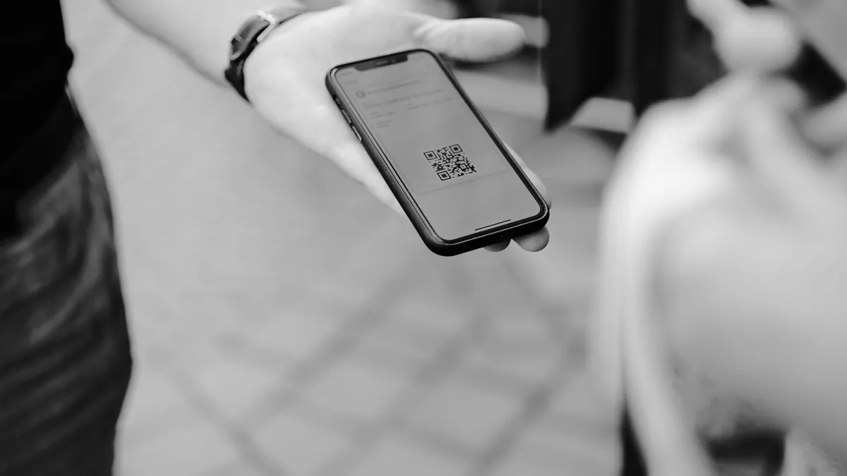 A person holding a cell phone